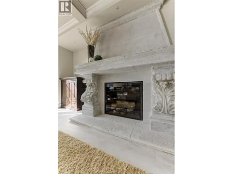 Huge Cultured Concrete Gas fireplace at 3673 Green Bay Landing, Lakeview Heights, West Kelowna