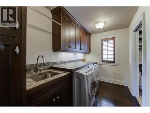 Laundry room with tons of storage, folding areas at 3673 Green Bay Landing, Lakeview Heights, West Kelowna