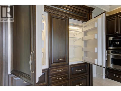 Paneled Subzero fridge and freezer at 3673 Green Bay Landing, Lakeview Heights, West Kelowna