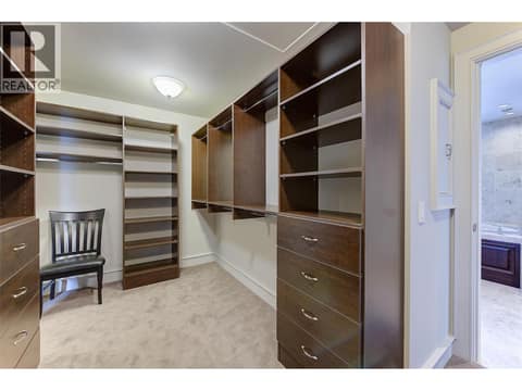 Primary walk in closet with built ins at 3673 Green Bay Landing, Lakeview Heights, West Kelowna