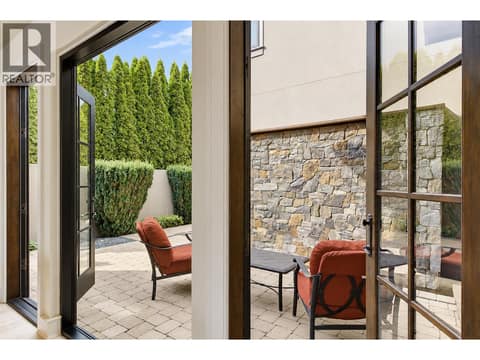 Time to sit and relax and enjoy the gentle Rock waterfall courtyard at 3673 Green Bay Landing, Lakeview Heights, West Kelowna