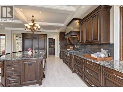 Tons of cabinets, tons granite counters for cooking at 3673 Green Bay Landing, Lakeview Heights, West Kelowna