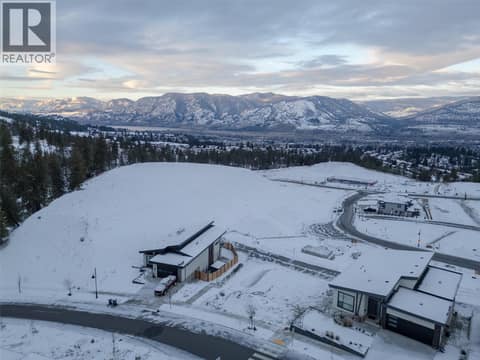 Aerial of neighborhood and lot. Elk on top, laneway beneath. at 1167 Elk Street, Columbia/Duncan, Penticton