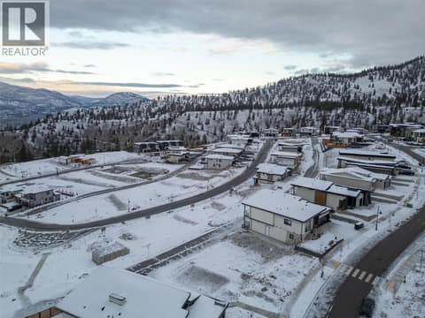 Aerial of neighborhood and lot. Elk on top, laneway beneath. at 1167 Elk Street, Columbia/Duncan, Penticton