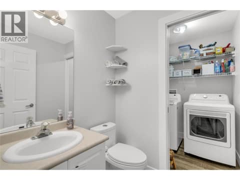 Convenient half bath by the garage at 3819 Glen Canyon Drive, Westbank Centre, West Kelowna