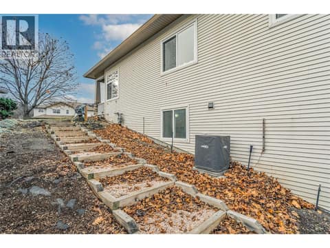 Easy stair access from front to back yard at 3819 Glen Canyon Drive, Westbank Centre, West Kelowna