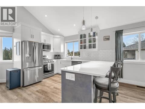 Tons of counter space on these lovely stone tops at 3819 Glen Canyon Drive, Westbank Centre, West Kelowna