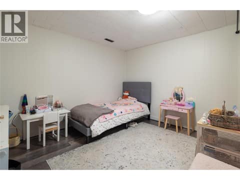 Lower suite den, currently used as a bedroom. at 2271 Francis Street, South BX, Vernon