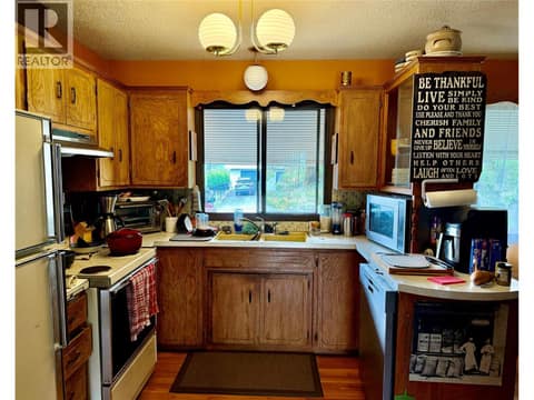 Upstairs kitchen at 2271 Francis Street, South BX, Vernon