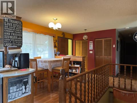 Upstairs kitchen eating area at 2271 Francis Street, South BX, Vernon