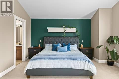 Primary bedroom featuring vaulted ceiling! at 2283 Shannon Heights Court Unit# 6, Shannon Lake, West Kelowna