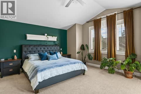 Primary bedroom fit for a king bed and oversized nightstands. at 2283 Shannon Heights Court Unit# 6, Shannon Lake, West Kelowna