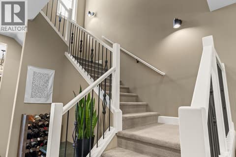 Stairs to upstairs bedrooms. at 2283 Shannon Heights Court Unit# 6, Shannon Lake, West Kelowna