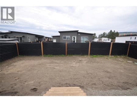Fenced rear yard at 12204 Westside Road Unit# 200, Okanagan North, Vernon
