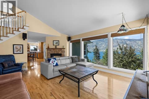 Gorgous living space equipped with a cozy fireplace. at 2620 Arthur Road, McKinley Landing, Kelowna