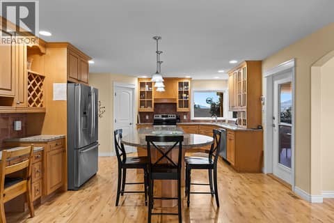 High end cabinetry throughtout this chefs kitchen with ample countertop space. at 2620 Arthur Road, McKinley Landing, Kelowna