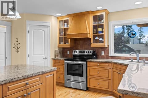 Large pantry off the kitchen for all your storage. at 2620 Arthur Road, McKinley Landing, Kelowna