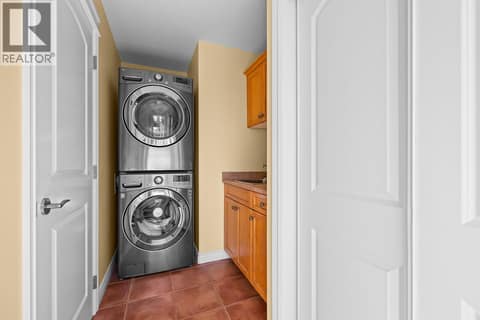 Laundry room and grocery drop zone off garage. at 2620 Arthur Road, McKinley Landing, Kelowna