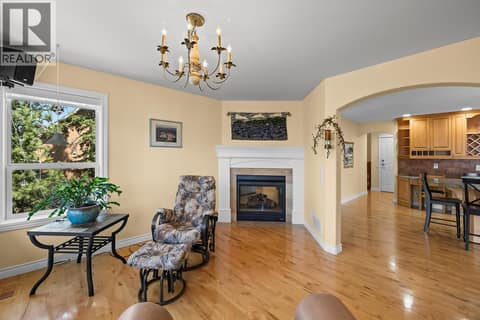 Living Space for quiet time with the shared fireplace. at 2620 Arthur Road, McKinley Landing, Kelowna