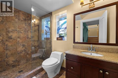 Lower level bath features beautiful custom shower. at 2620 Arthur Road, McKinley Landing, Kelowna