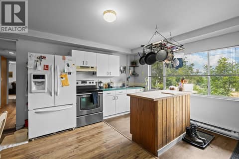 LOWER LEVEL KITCHEN at 3490 Paynter Road, Westbank Centre, West Kelowna