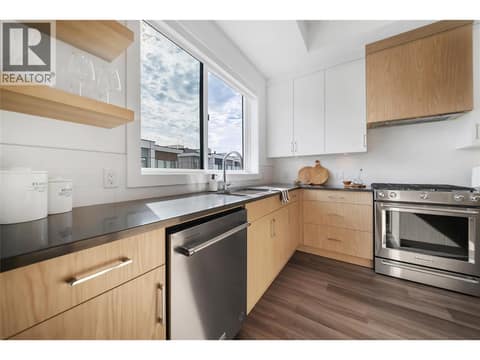 Kitchen with quartz counters and stainless appliances - gas range at 2100 Campbell Place Unit# 154, Lakeview Heights, West Kelowna