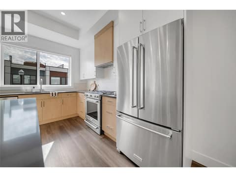 Kitchen with quartz counters and stainless appliances - gas range at 2100 Campbell Place Unit# 154, Lakeview Heights, West Kelowna