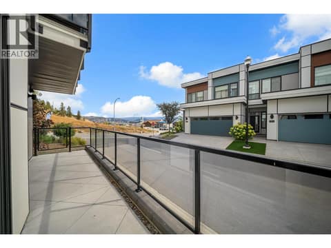 Lower level deck with gate access at 2100 Campbell Place Unit# 154, Lakeview Heights, West Kelowna