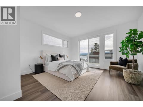 Primary bedroom with access to deck at 2100 Campbell Place Unit# 154, Lakeview Heights, West Kelowna