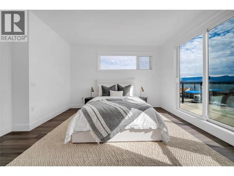 Primary bedroom with access to deck at 2100 Campbell Place Unit# 154, Lakeview Heights, West Kelowna