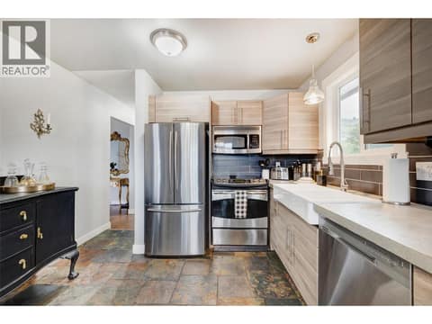 Side B top - Furnishings and decor may be different from current tenants at 3874-3876 Glenway Road, Glenrosa, West Kelowna