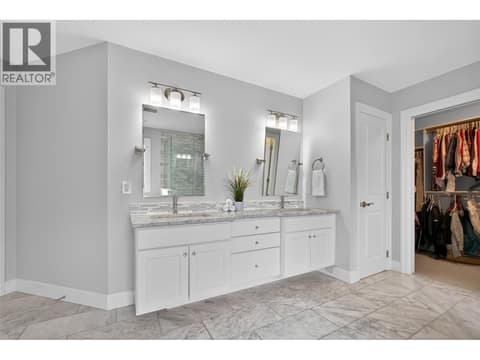 Double vanity with heated floors throughout at 1996 Twin Ridge Court, Wilden, Kelowna