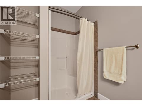 Full bathroom on the lower level at 1996 Twin Ridge Court, Wilden, Kelowna
