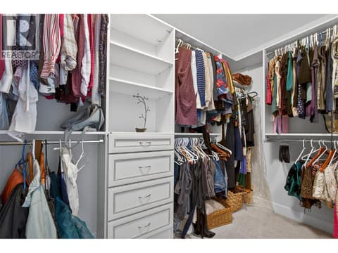 Her closet at 1996 Twin Ridge Court, Wilden, Kelowna