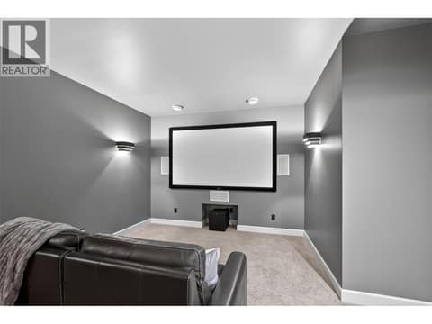 Movie theatre on the lower level at 1996 Twin Ridge Court, Wilden, Kelowna