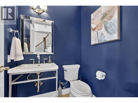 Powder room on the main level at 1996 Twin Ridge Court, Wilden, Kelowna