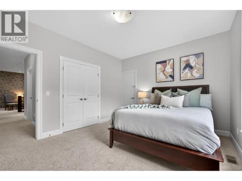Second bedroom on the upper level with access to attic at 1996 Twin Ridge Court, Wilden, Kelowna