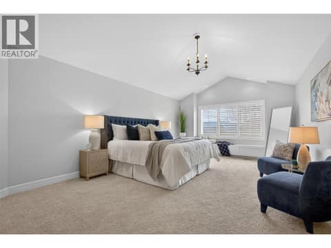 Spacious primary bedroom with vaulted ceilings at 1996 Twin Ridge Court, Wilden, Kelowna