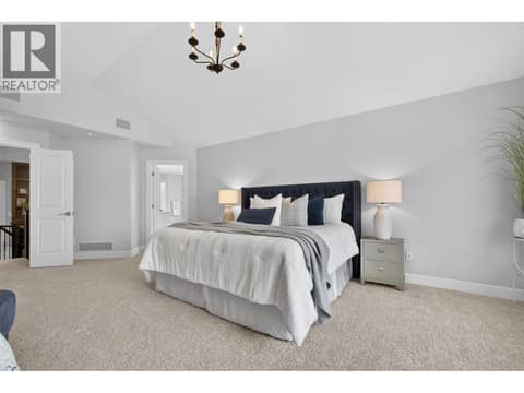 Spacious primary bedroom with vaulted ceilings at 1996 Twin Ridge Court, Wilden, Kelowna