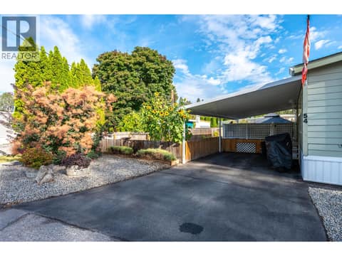 Carport/driveway. at 8712 Steuart Street Unit# 54, Summerland Rural