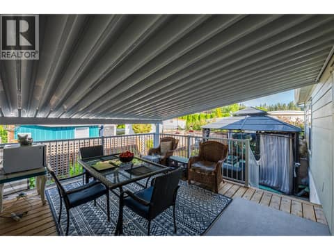 Covered deck. at 8712 Steuart Street Unit# 54, Summerland Rural