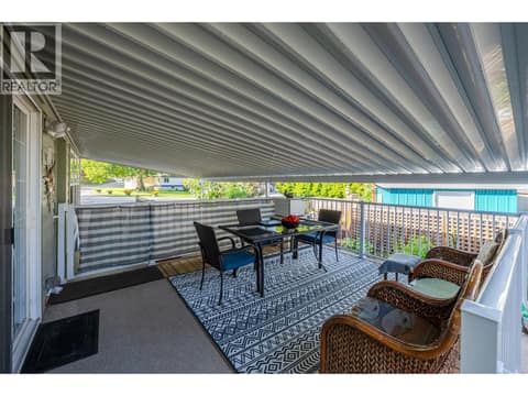 Covered deck. at 8712 Steuart Street Unit# 54, Summerland Rural