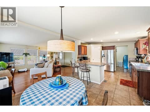 Dining/kitchen. at 8712 Steuart Street Unit# 54, Summerland Rural