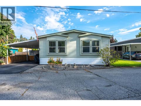 Front of home. at 8712 Steuart Street Unit# 54, Summerland Rural