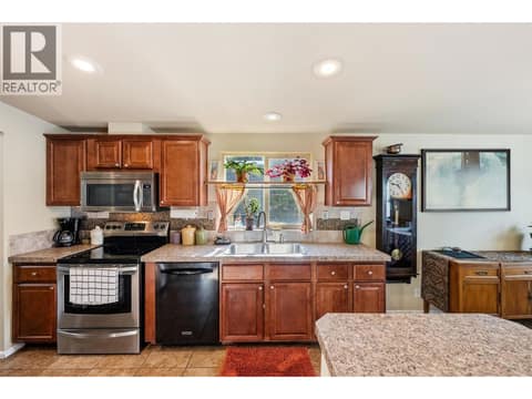 Kitchen. at 8712 Steuart Street Unit# 54, Summerland Rural