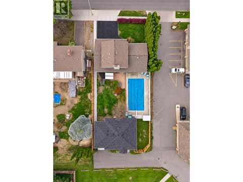 Aerial photo- front home on Mountain ave- back home with lane access at 1859-1861 Mountain Avenue, Glenmore, Kelowna