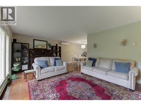 Bright Living Room with lovely maple hardwood flooring at 1859-1861 Mountain Avenue, Glenmore, Kelowna