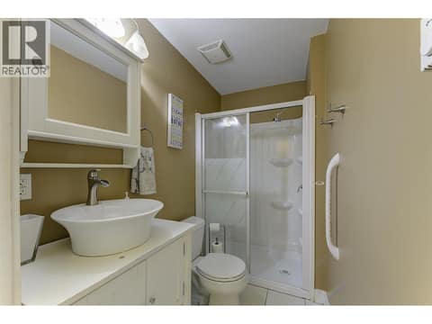 Full 3 piece bathroom on main for studio and off main family room at 1859-1861 Mountain Avenue, Glenmore, Kelowna