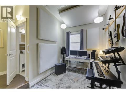 Garage built out with full bathroom and den/ art room/ sound studio/ student area at 1859-1861 Mountain Avenue, Glenmore, Kelowna