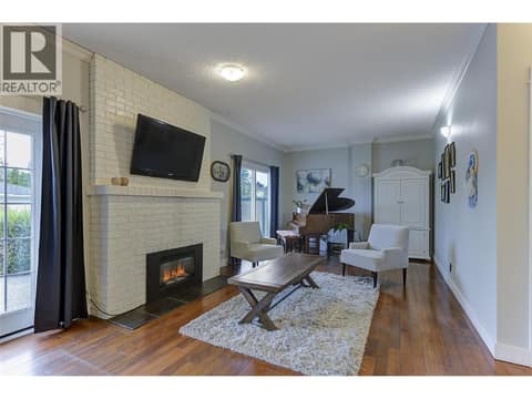 Gas fireplace- room for a grand piano! at 1859-1861 Mountain Avenue, Glenmore, Kelowna